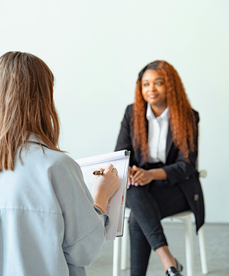 Nurse practitioner assessing a client