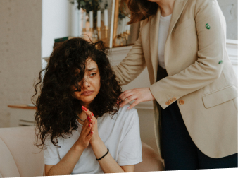 Nurse practitioner comforting client